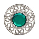 Stroma Brooch displayed against a neutral background, emphasizing its unique pewter texture and artistic flair.