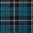 Close-up of The Laird Hooded Scarf Cape, emphasizing its premium lightweight tartan fabric and handcrafted quality.