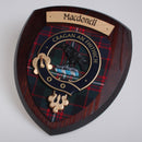 MacDonell Clan Crest Plaque showcasing a handcrafted hardwood shield with the clan's tartan, made to order in Glasgow, Scotland.