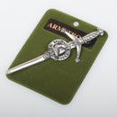 Clan Crest Pewter Kilt Pin with Armstrong Crest displayed on a textured background, showcasing its antique palladium finish and intricate design, perfect for Scottish heritage.