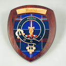 Dunlop Clan Crest Plaque, a handmade wall decor from Glasgow, Scotland, featuring a hardwood shield and unique tartan design approved by the Standing Council of Scottish Chiefs.