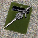 Clan Crest Pewter Kilt Pin with MacNaughton Crest displayed on a rustic background, showcasing its antique palladium finish and detailed craftsmanship.
