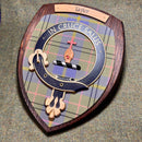 Close-up view of the Taylor Clan Crest Wall Plaque, featuring intricate details and vibrant tartan, handmade in Glasgow, Scotland.