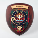 Carnegie Clan Crest Plaque handcrafted in Glasgow, Scotland, featuring a beautiful hardwood shield and clan tartan, perfect for gifting or home decoration.