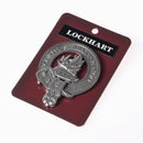 Lockhart Clan Crest Badge in Pewter displayed on a surface, showcasing the intricate belted design representing the clan member.