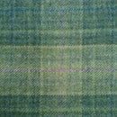 Shetland Tweed fabric showcasing its rich texture and vibrant colors, perfect for crafting high-quality garments.