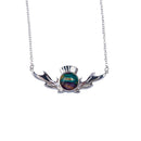 Close-up of the Heathergems Thistle Necklace, highlighting the intricate details and silver plating of the pendant.