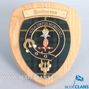 Henderson Clan Crest Plaque showcasing Scottish heritage handcrafted from durable hardwood, featuring authentic tartan accents, perfect for wall decor.