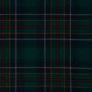 Woman sewing with Medium Weight Old & Rare Tartans, highlighting the versatility and charm of these unique tartan fabrics.
