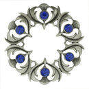 Antique Scottish Thistle Plaid Brooch showcasing small colored stones, perfect for adding a touch of Scottish heritage to your outfit.