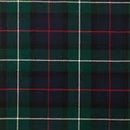 Display of Lightweight Swatches laid out, highlighting the detailed craftsmanship of tartan fabrics from The Kiltmakery.
