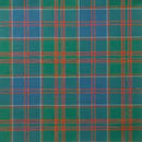 Tartan Poncho - Reiver, perfect for any occasion, displayed in a cozy outdoor setting.