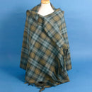 Gordon Weathered Tartan Wool Stole by Ingles Buchan, showcasing luxurious 100% pure new wool in a stylish tartan pattern, perfect for adding a touch of Scottish class to any outfit.
