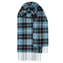 Versatile Bowhill Standard Tartan Lambswool Scarf displayed with winter wardrobe essentials, blending warmth and style.