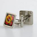 Chisholm Clan Crest Cufflinks in a metallic finish presentation box, showcasing custom resin doming technique for a stunning look.