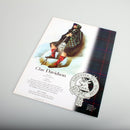 Davidson Scottish Clan Poster A4 featuring the clan tartan, crest, and a clansman illustration, highlighting its glossy finish and rich colors.