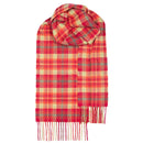 Bowhill Standard Tartan Lambswool Scarves from Lochcarron showcasing a vibrant tartan pattern against a scenic backdrop.