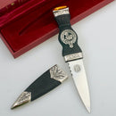 MacDonald Clan Crest Sgian Dubh - Stone Top showcasing its stunning gold foil backed stone and intricate thistle design, representing Scottish craftsmanship and heritage.