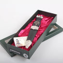 Johnstone Clan Crest Stone Top Thistle Design Sgian Dubh featuring elegant pewter Celtic patterns and an amber stone top, perfect for celebrating Scottish heritage.