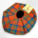 Stylish Matheson Ancient Wool Tam in vibrant tartan print, perfect for adding flair and warmth during fall and winter.
