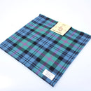 Wool Tartan Pocket Square in Baird Ancient Tartan by Ingles Buchan, showcasing its vibrant colors and classic design, perfect for elevating any formal outfit.