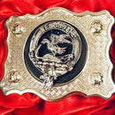 Graham Pewter Clan Crest Buckle for Kilt Belts elegantly displayed with a leather pad, highlighting its durability and style.