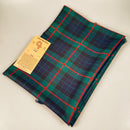 Gunn Modern Tartan Shawl made from 100% pure new wool, lightweight and versatile with fringed edges, ideal for wrapping or as a stylish table cover.