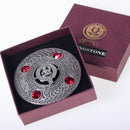 Livingstone Clan Crest Pewter Plaid Brooch worn on tartan fabric, illustrating its stylish appeal for Scottish pride and heritage celebrations.