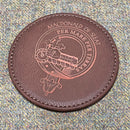 Stylish Clan Crest Leather Effect Coaster showcasing an engraved clan emblem, perfect for adding elegance and heritage to your home decor.
