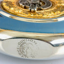 Hannay Clan Crest Pewter Sporran Flask in use at a picnic, highlighting Scottish heritage and customization options.