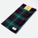 Sutherland Old Modern Tartan Wool Headscarf displayed elegantly, showcasing its soft texture, vibrant tartan pattern, and fringed ends, perfect for fashion-forward women.