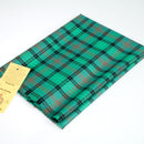 Ross Hunting Ancient Wool Tartan Shawl showcasing its light 8oz pure new wool fabric and fringed design, perfect for warmth and style.