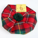 Boyd Modern Tartan Wool Tam displayed on a cozy background, showcasing its stylish and lightweight design, perfect for adding a classic flair to any outfit.