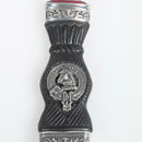 Close-up of the stone top on the Hepburn Clan Crest Sgian Dubh, highlighting the gold foil backing and multi-faceted cut.