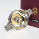 Hannay Clan Crest Quaich with Gold Trim showcasing a beautiful pewter design and elegant gold-plated insert, celebrating Scottish tradition and craftsmanship.