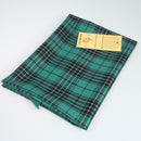 MacLean of Duart Hunting Ancient Wool Tartan Shawl displayed on a model, showcasing its vibrant colors and soft texture, perfect for keeping warm or as a stylish table cover.