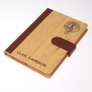 Cameron Clan Crest Luxury Bamboo Covered Notebook showcasing the elegant bamboo cover and leather trim, perfect for writing notes and sketches.