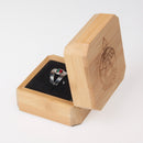 Close-up of the engraving on the Clan Crest Engraved Luxury Wooden Ring Box highlighting custom options.