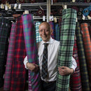 Springweight Tartan Material, 8oz Wool Plain Weave showcasing its vibrant colors and classic patterns, perfect for lightweight sewing projects.