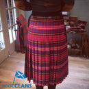 Ladies Tartan Poly Kilted Skirt from The Kiltmakery showcasing a stylish and feminine cut, highlighting its lightweight polyviscose fabric ideal for modern Scottish fashion.