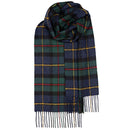 Person wearing a Bowhill Standard Tartan Lambswool Scarf, demonstrating its stylish versatility and warmth for winter fashion.