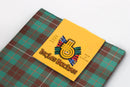 Close-up of the Wool Tartan Pocket Square in MacKinnon Hunting Ancient Tartan, highlighting its 100% pure wool texture and unique tartan pattern ideal for stylish accessories.