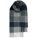 Bowhill Standard Tartan Lambswool Scarf draped elegantly over a winter coat, demonstrating its versatility and elegance.