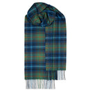Bowhill Standard Tartan Lambswool Scarves in a cozy winter setting, showcasing their luxurious texture and classic tartan patterns.