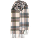 Warm Bowhill Standard Tartan Lambswool Scarf draped over a coat, emphasizing its cozy appeal and Scottish heritage.