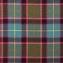 Casual indoor shot of the Tartan Poncho - Reiver, embodying comfort and classic design.