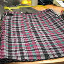 Styled shot of the Borthwick Ancient Heavyweight Hand Stitched Kilt paired with matching flashes, perfect for any formal Scottish occasion.