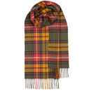 Casual winter outfit featuring the Bowhill Standard Tartan Lambswool Scarf, adding a touch of elegance and warmth to the look.