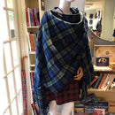 Lambswool Serape featuring a luxurious tartan pattern from Ingles Buchan, perfect for stylish warmth and comfort during colder months.