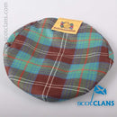 Pure Wool Golf Cap in Chisholm Hunting Tartan showcasing luxury and comfort with a 3/4" stretch headband, perfect for golf, shooting, or everyday wear.
